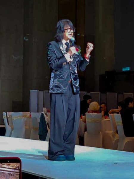 Prof. Dato’ Sri Dr. Mike Chan addresses guests at Couture Fashion Week Malaysia 2026, sharing his perspective on fashion, wellness, and living well.